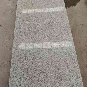 铜仁芝麻白光面毛板